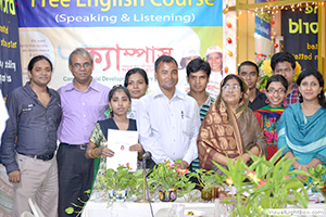 Principal Hamida Ali, Founder Principal of South Point School & College, is giving Certificates to the Participants of the Free English Course (Batch 5) as Chief Guest; Dr. M Helal is presiding over. (2013)