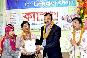 Chairman of Bangladesh Telecommunication Regulatory Commission (BTRC), Dr. Shahjahan Mahmood, is giving Certificates to the Participants of the Free English Course (Batch 17) as Chief Guest; Dr. M Helal is presiding over. (2016)
