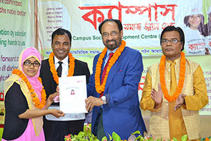 Barrister M. Amir-ul Islam is giving Certificates to the Participants of Free English Course (Batch 18) as Chief Guest; Dr. M Helal is presiding over. (2017)