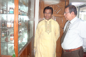 Dr. M Helal is showing Campus Movement for raising awareness on Herbal Food & Medicine to Vice-Chancellor of Southeast University Prof. Dr. Anowar Hossain (2012)