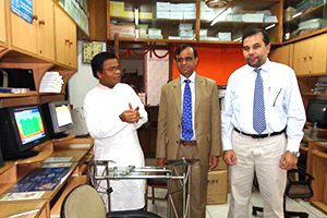 Dr. M Helal is explaining CMD Technology to the Managing Director of Dhaka Stock                         Exchange, Dr. Swapan Kumar Bala and Secretary Shish Haider Chowdhury (2014)